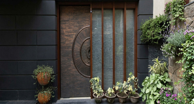 Sculpted Copper Entrance Door